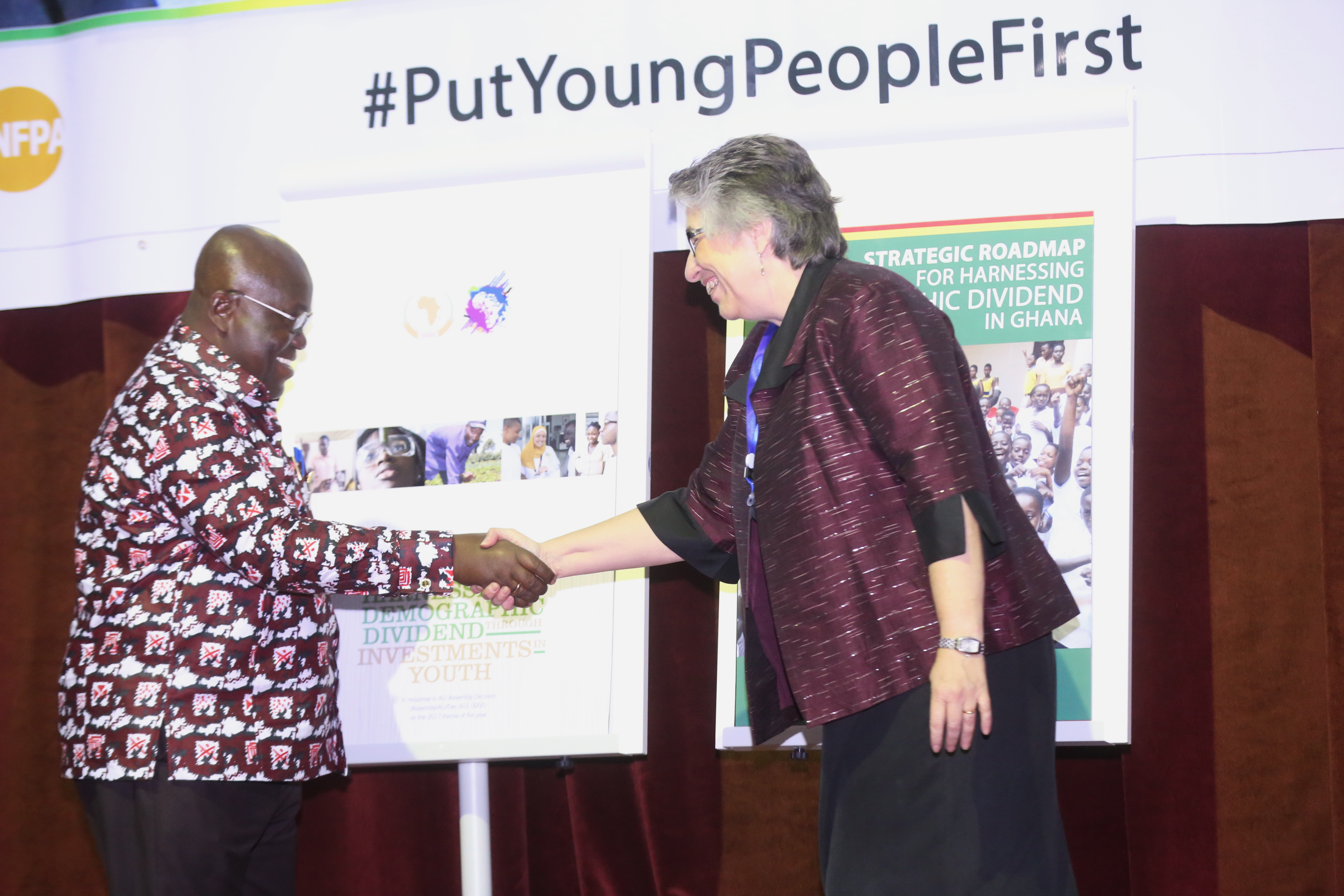 President Akufo-Addo in a handshake with Ms Christine Evans Klock, UN Country Director after unveiling the Demography Roadmap for Harnessing Demographic Dividend in Ghana.